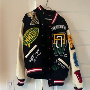 Trendy Black and Cream Varsity Jacket with Patches